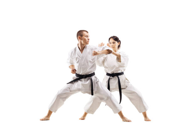 istock karate girl and boy fighting 1372874711