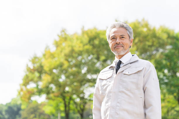 istock senior asian businessman, construction worker 1372875876