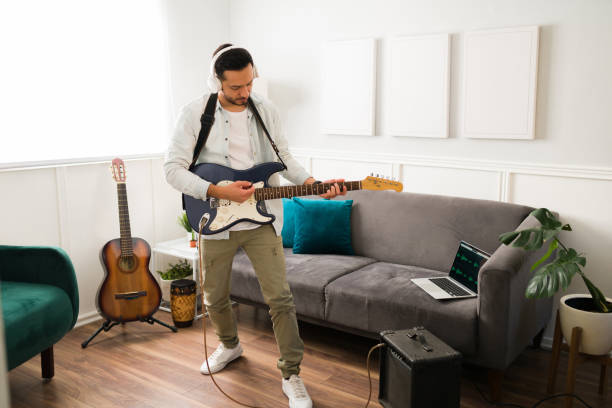 istock Talented male musician rehearsing 1372878724