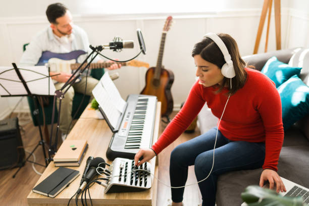 istock Artists on a home recording studio 1372878761