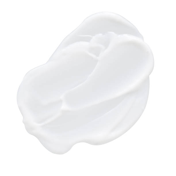 istock Skincare cream for face smooth texture or yogurt isolated on white background 1372887565