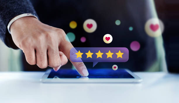 Customer Experiences Concept. Closeup of  Businessman Using Digital Tablet to Giving Feedback via the Internet. Positive Review. Client Satisfaction Surveys. Front View
