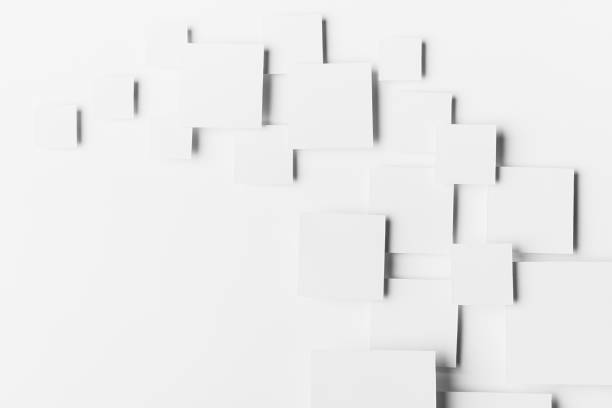 istock White geometric pattern of squares as wave or flow in sunlight with soft light grey shadows, border, copy space, top view. Modern abstract background in futuristic style. 1372899795