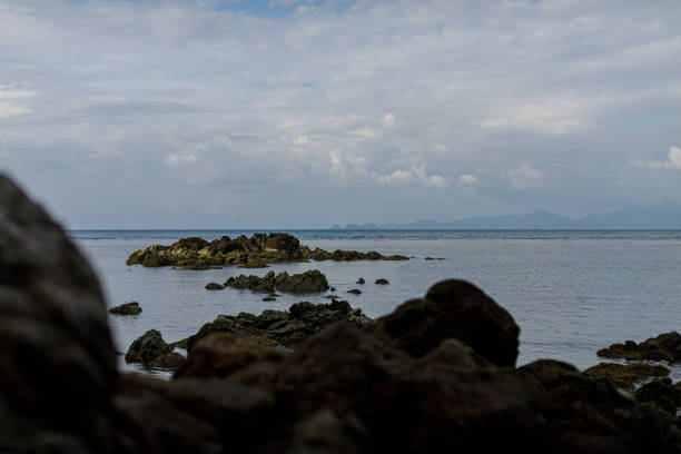 Rocks on the beach, Calm sea after the rain.