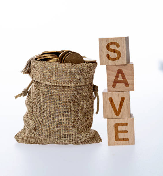 istock Money bag and word save on white background 1372905866