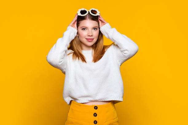 istock Attractive girl in white sweater 1372908964