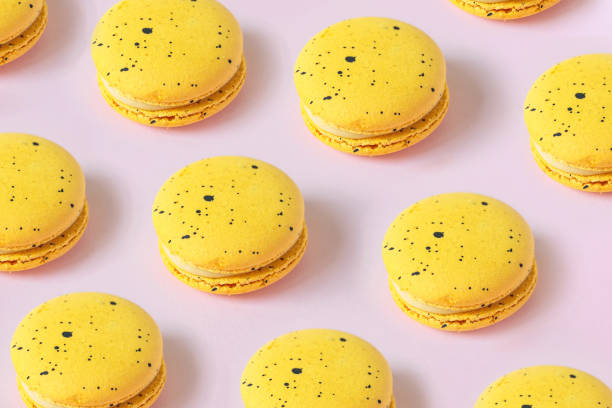 istock macarons pattern, french desserts on pink background 1372924515