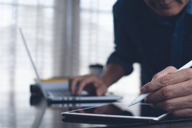 istock Working on laptop computer, mobile smart phone and digital tablet 1372925133
