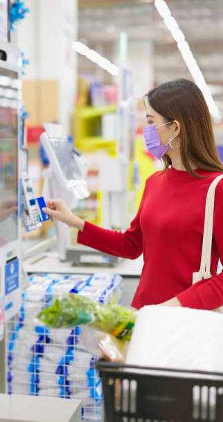 istock Self service checkout in supermarket 1372925138