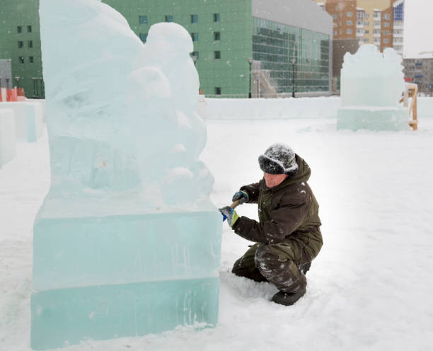 istock Portrait of a sculptor at work with a chisel 1372925468