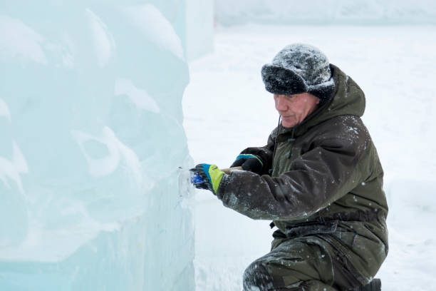 istock Portrait of a sculptor at work with a chisel 1372925476