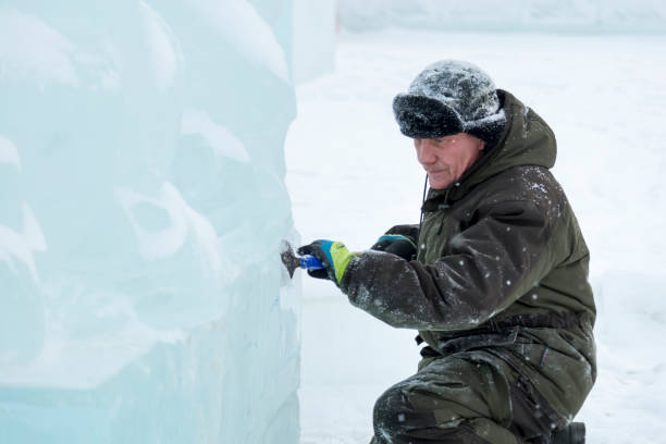 istock Portrait of a sculptor at work with a chisel 1372925477