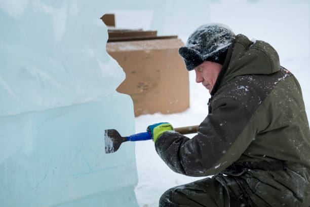 istock Portrait of a sculptor at work with a chisel 1372925481