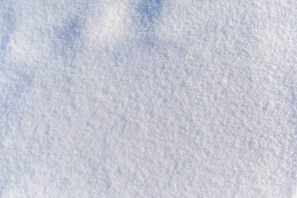istock Clean, white snow close up. Winter background. Snow surface 1372928176