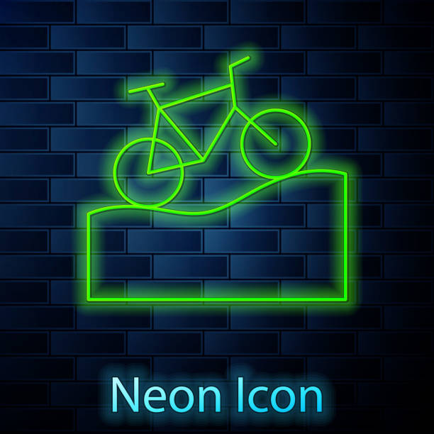 istock Glowing neon line Mountain bicycle icon isolated on brick wall background. Bike race. Extreme sport. Sport equipment. Vector 1372930401