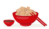 istock Tofu in red bowl with chopsticks and soya sauce 1372931525