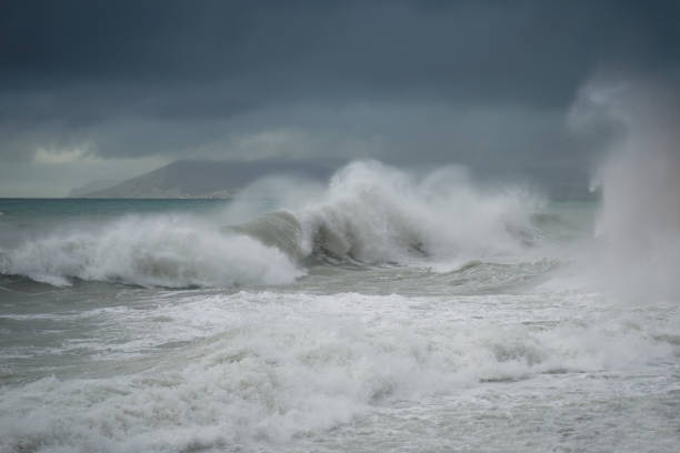 istock Stormy Sea Waves Splashing at Coastline. 1372934554