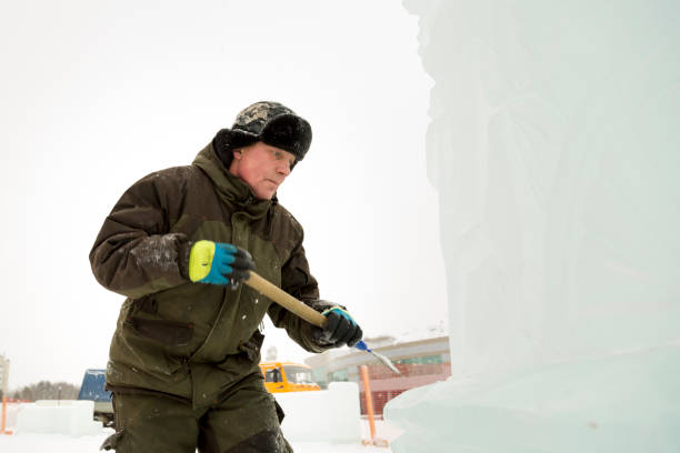 istock Portrait of a sculptor at work with a chisel 1372935682