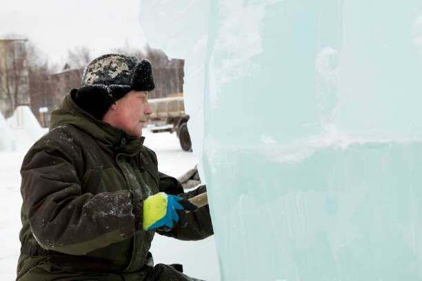 istock Portrait of a sculptor at work with a chisel 1372935693
