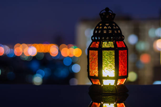 istock Lantern with apartment building background 1372935911