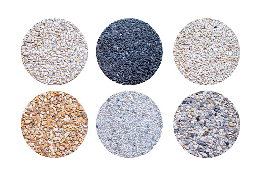 Example of Exposed aggregate concrete with different colored pebbles in close-up