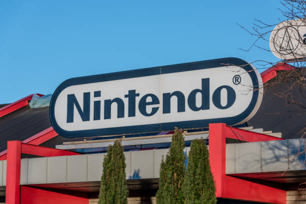 Nintendo logo on top of a building entrance.. Kungsbacka, Sweden - January 30 2022: Nintendo logo on top of a building entrance. brand name games console stock pictures, royalty-free photos & images