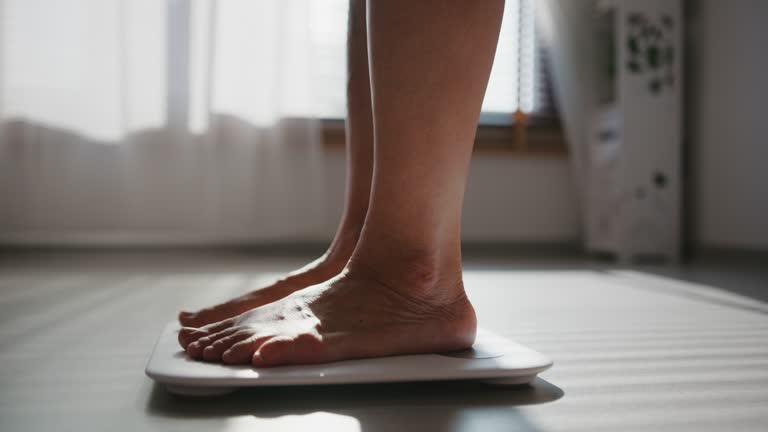 https://media.istockphoto.com/id/1372942109/video/stepping-lag-to-digital-weight-scales-weighing-scales.jpg?s=640x640&k=20&c=KgV_7QfP9lxMWB4mCCpqvF8etD_QK9yW6DoD9M7vY_w=