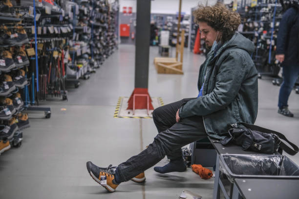 istock Trying on casual shoes for nature walking 1372943129