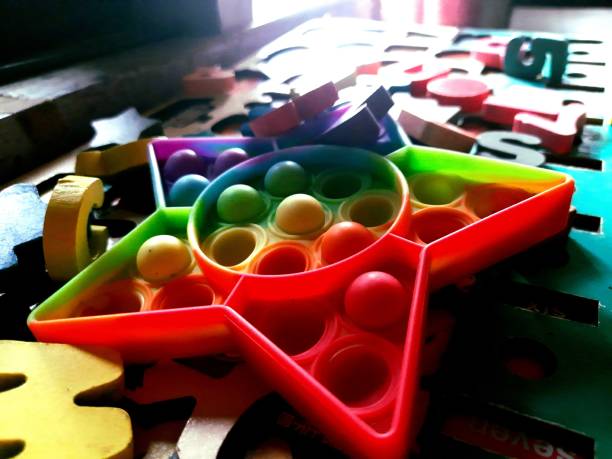 istock a fidget toy with star shape and many colors 1372943891