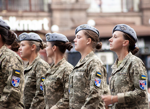 Ukraine, Kyiv - August 18, 2021: Military girls. Airborne forces. Ukrainian military. There is a detachment of rescuers marching in the parade. March crowd. Army soldiers. Woman soldier in uniform