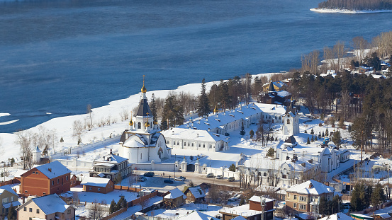 Top view of Holy Assumption Monastery on the banks of the Yenisey river in Krasnoyarsk, Russia on a frosty winter day