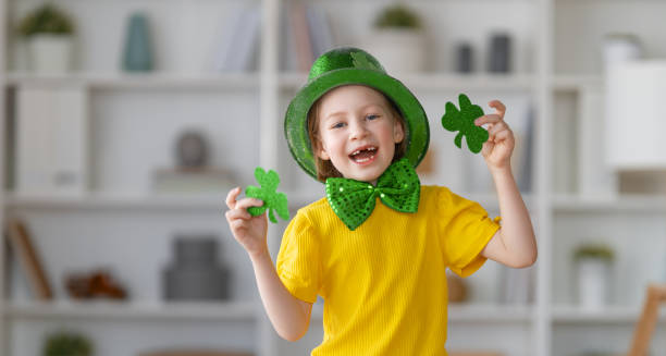istock child is celebrating St. Patrick's Day 1372944924