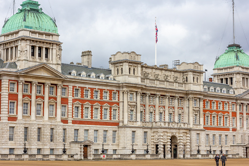 Old Admiralty House in Whitehall, London, with people on Horse Guards Parade.