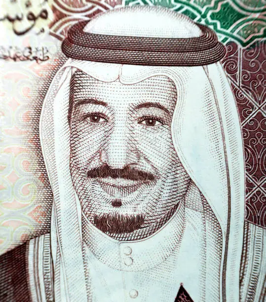 Photo of king Salman Bin Abdulaziz Al Saud, the king of Saudi Arabia kingdom from the obverse side of 100 one hundred Saudi riyal bill banknote money