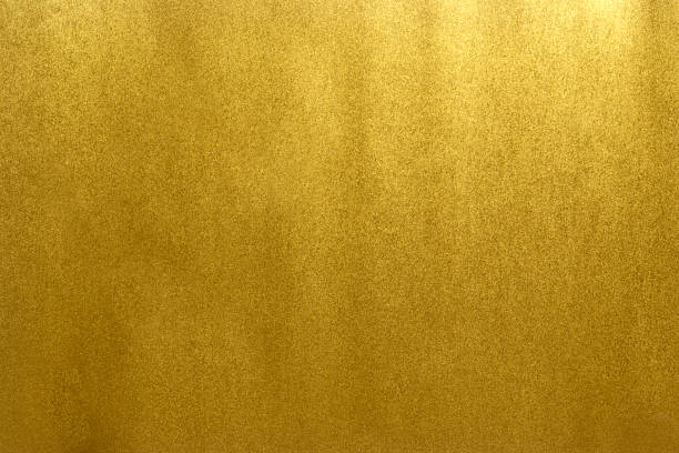 Gold background Close-up shot of abstract gold background. gold leaf metal photos stock pictures, royalty-free photos & images