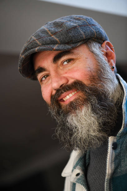 istock Portrait of man with cap and beard 1372951799