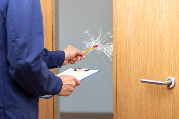 repairman's hand checking to repair glass of the door - shattered glass broken window damaged imagens e fotografias de stock