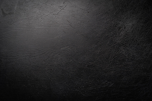 Black Wooden structural surface or background. Top view.
