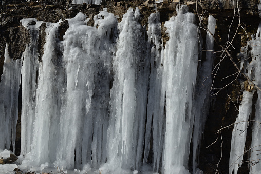 Frozen waterfall along the White River in Branson, Missouri, USA - January 24,2022 :
