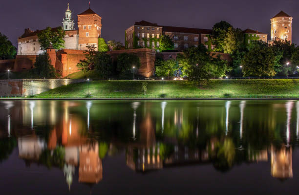 Krakow, Poland - nearly 1000 years old and part of the Unesco World Heritage Old Town Krakow, the Wawel Castle is a wonderful example of several architectural styles. Here the castle at night