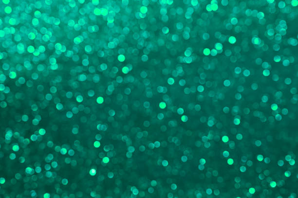 istock Trendy vivid green blurred and sparkling background 1372962286