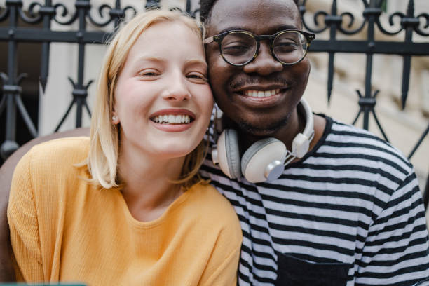 istock Happy young people on the street 1372963452