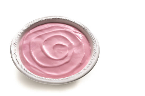 Pink berries yogurt bowl isolated on white background strawberry yoghurt