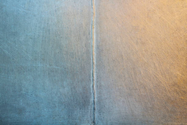 Old aluminum iron sheet. Weld. Close-up. Background. Texture.