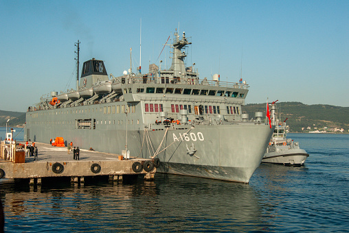 Turkey - April 24, 2007: TCG İskenderun A1600 takes part in the Military Logistics activities of the Turkish Navy. This ship, which has the status of a passenger ship, took its passengers to commemorate the Gallipoli Wars and anchored in Çanakkale.