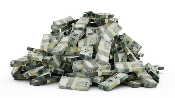 istock 3D rendering of Mexican Peso notes transferring from one phone to another. mobile money transaction concept 1372978540