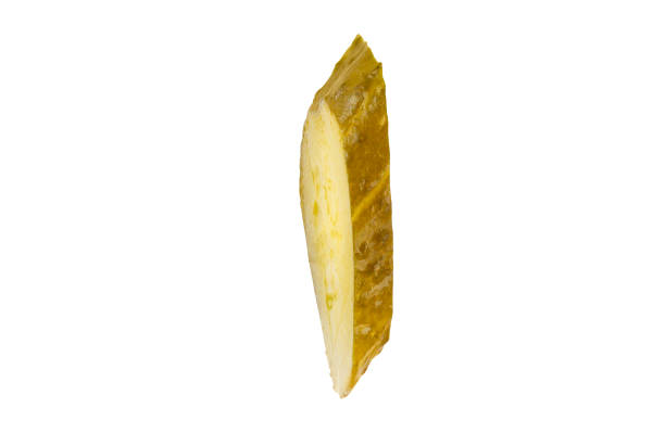 istock Piece of pickled cucumber isolated on white background. 1372979169
