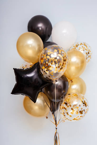 istock balloon black and gold 1372980197