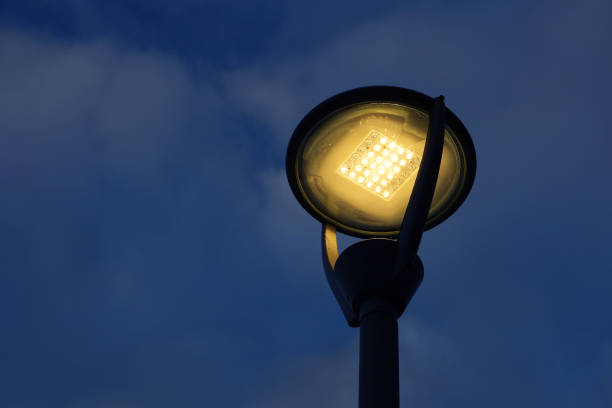 istock Glowing led lamp on background of evening sky 1372981700