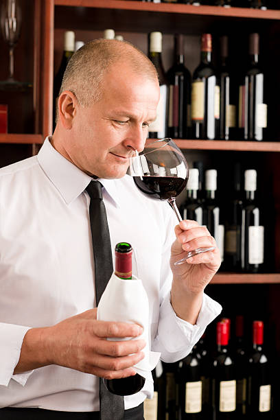 istock Bar waiter smell glass red wine restaurant 137298214